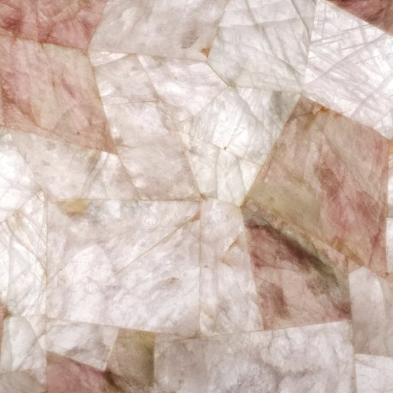 Close-up of a textured surface with pink and white colors