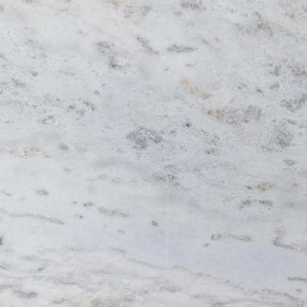 Close-up of a light gray granite surface with subtle variations