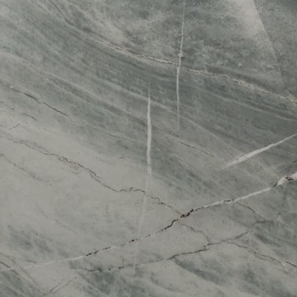 Close-up of a gray marble surface with veining