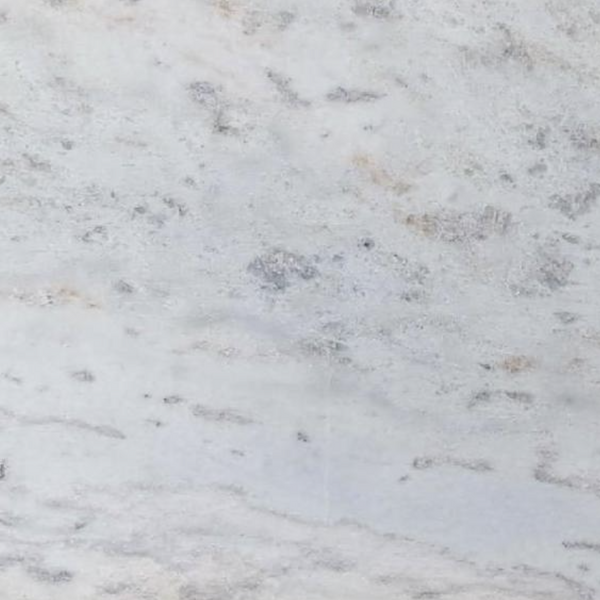 Close-up of a light gray granite surface with subtle variations